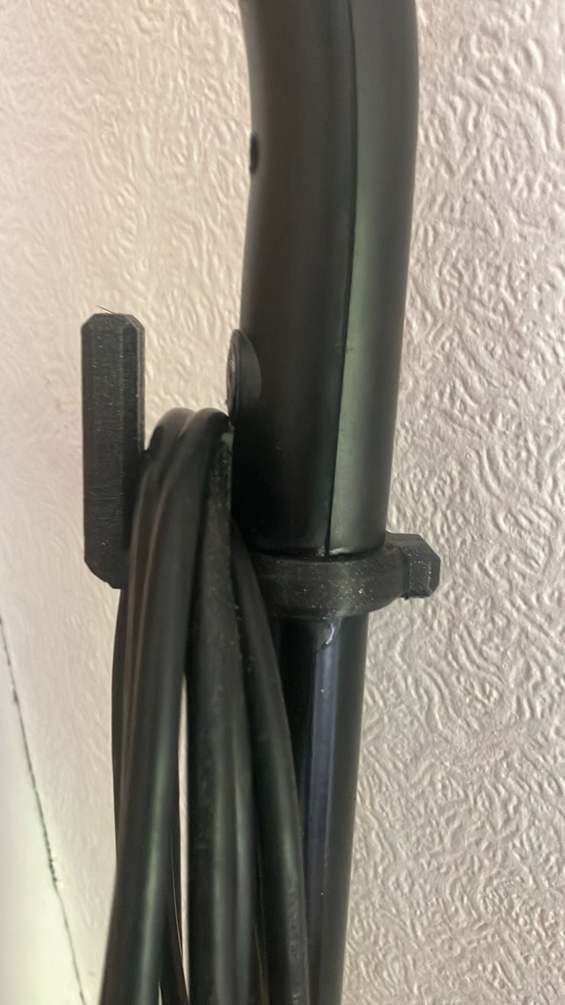 Cable hook for steam mop/vacuum cleaner