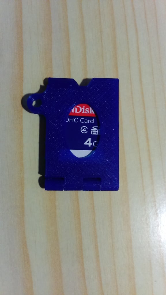 SD card case with key ring and integrated hinge