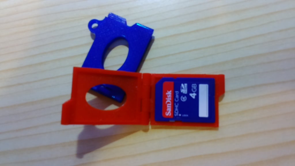 SD card case with key ring and integrated hinge