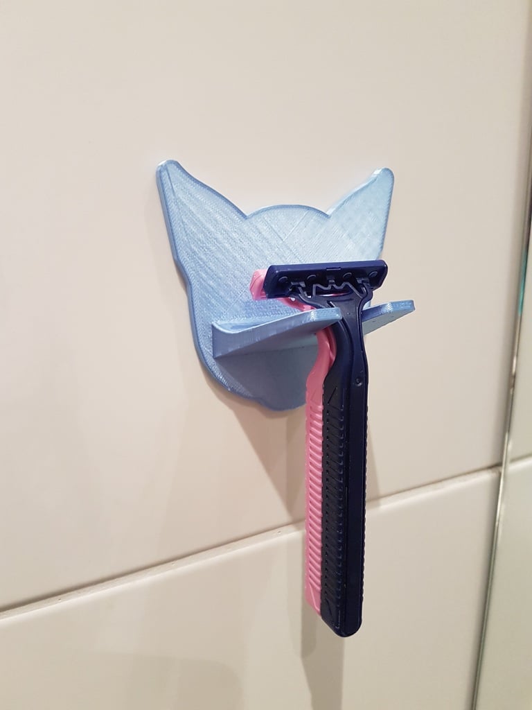 Razor holder shaped like a cat