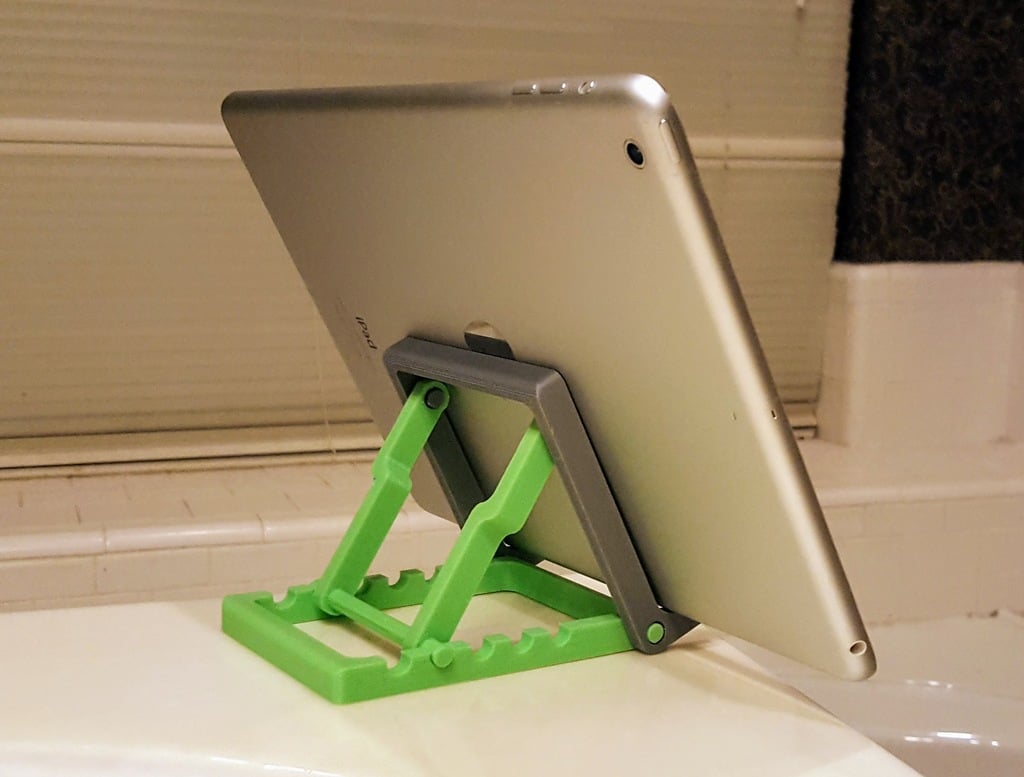 Adjustable tablet holder with improved design