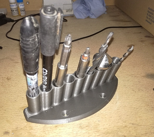 Wall or table holder for pen, pencil and tools