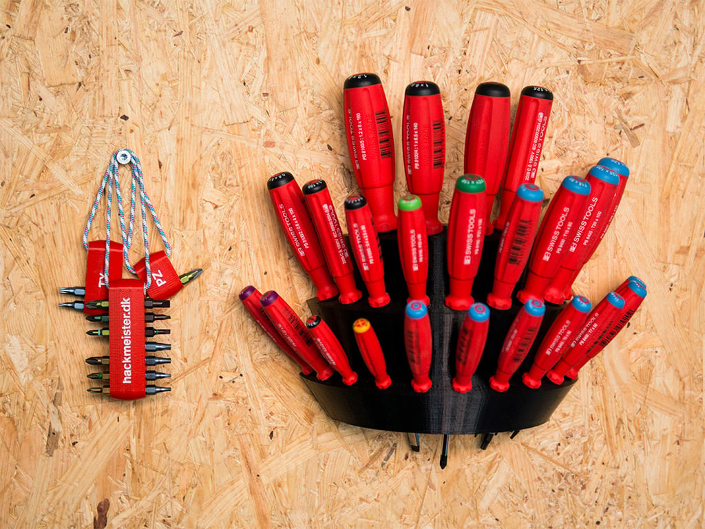 Wall-mounted holder for 24 different screwdrivers
