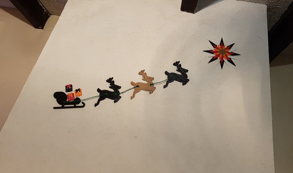 Christmas decoration with sleigh, reindeer and gifts for the chimney