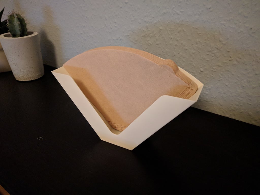 Wall-mounted holder for coffee filters