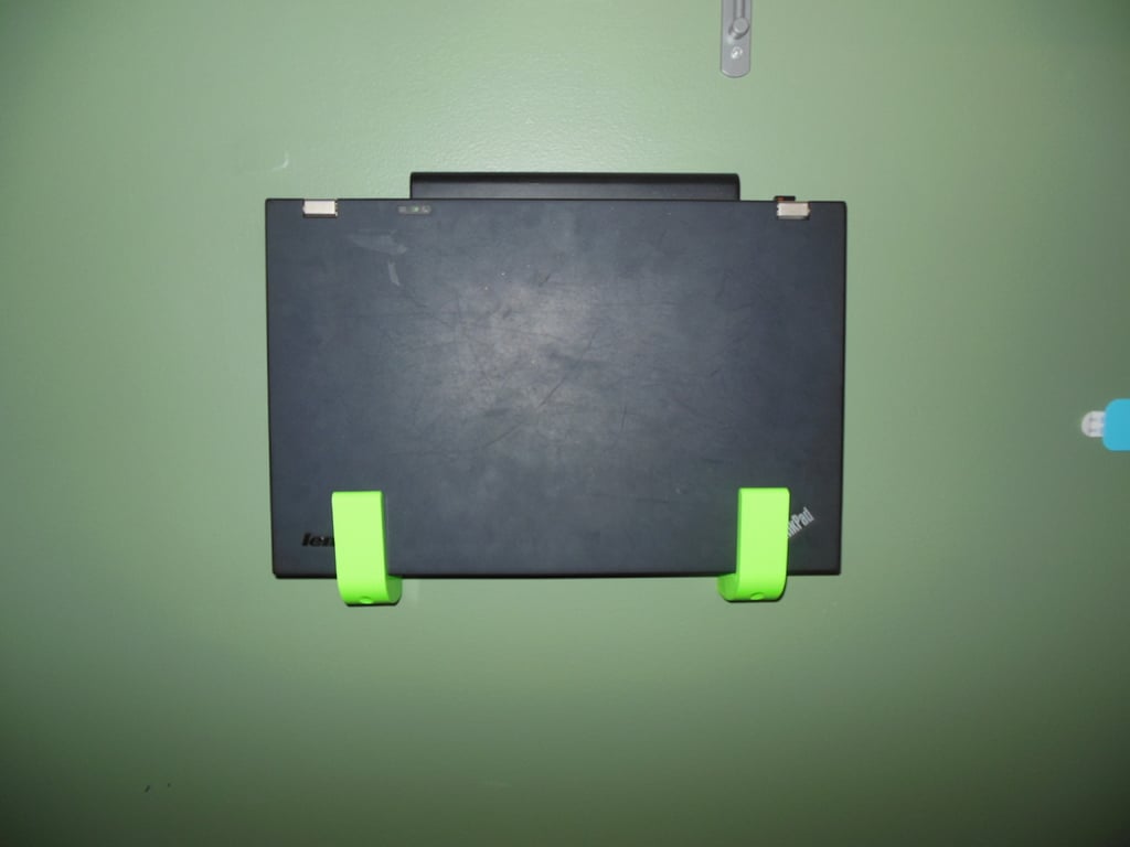 Wall-mounted laptop holder for Apple, Lenovo and MacBook
