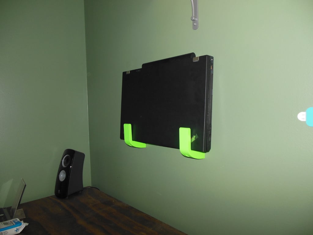 Wall-mounted laptop holder for Apple, Lenovo and MacBook