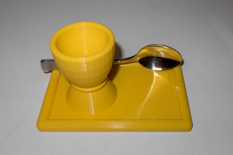 Egg cup with plate and spoon holder