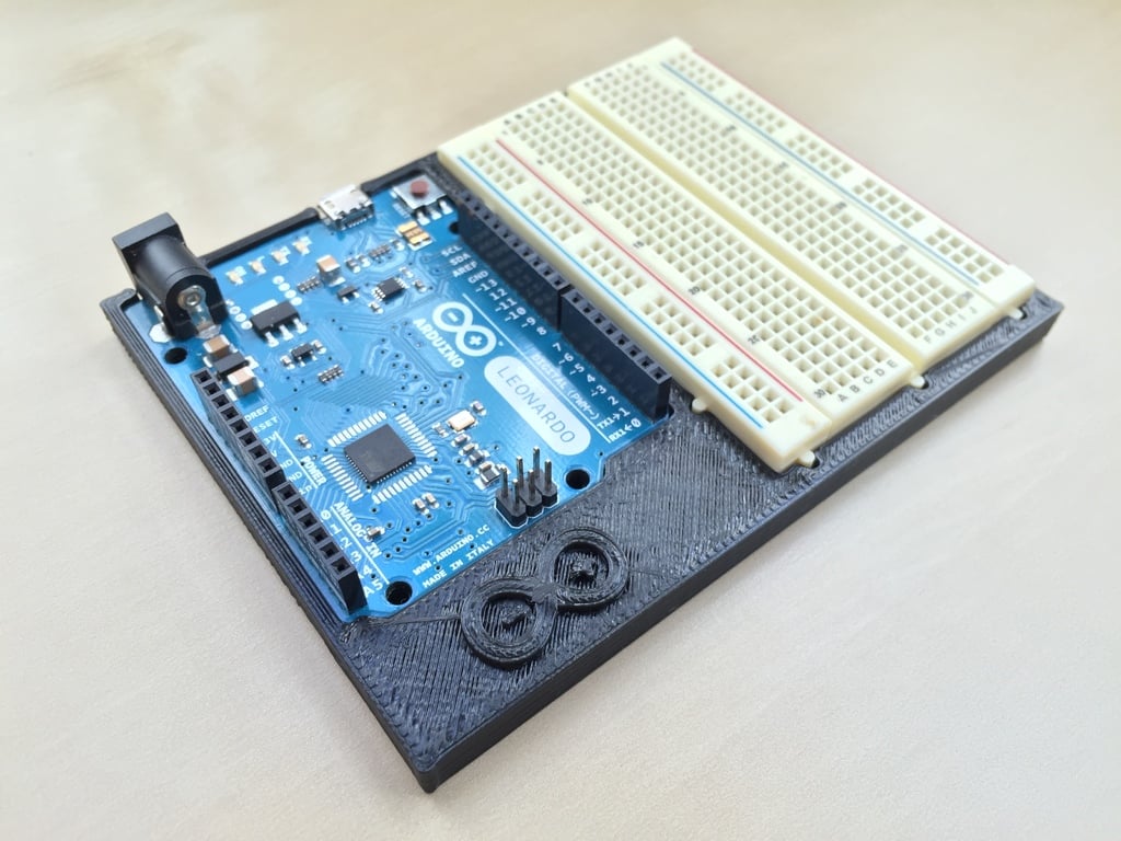 Holder for Arduino Leonardo and half-sized breadboard