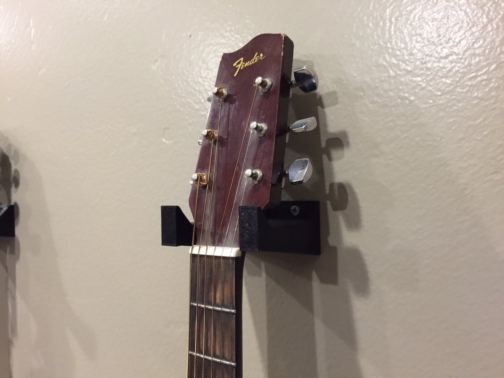 Wall mounted guitar rack