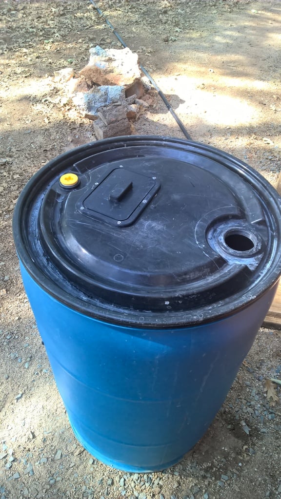Reservoir lid for barrels and large containers