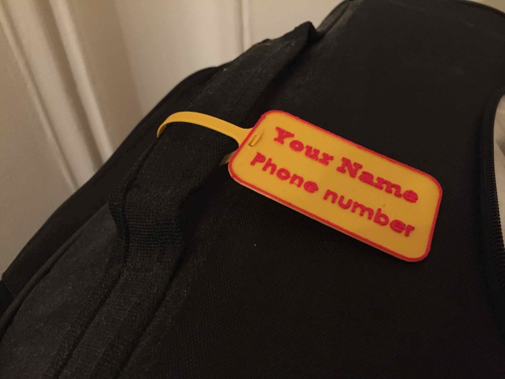 Baggage label for personalization with name and phone number