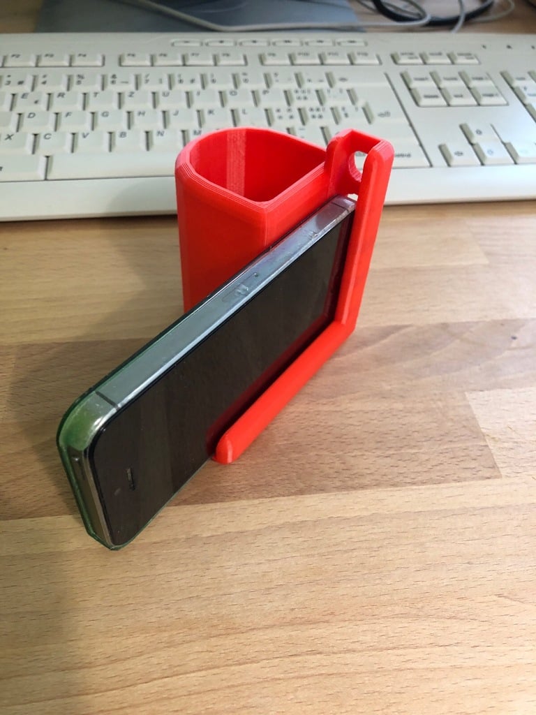 Camera grip and phone stand