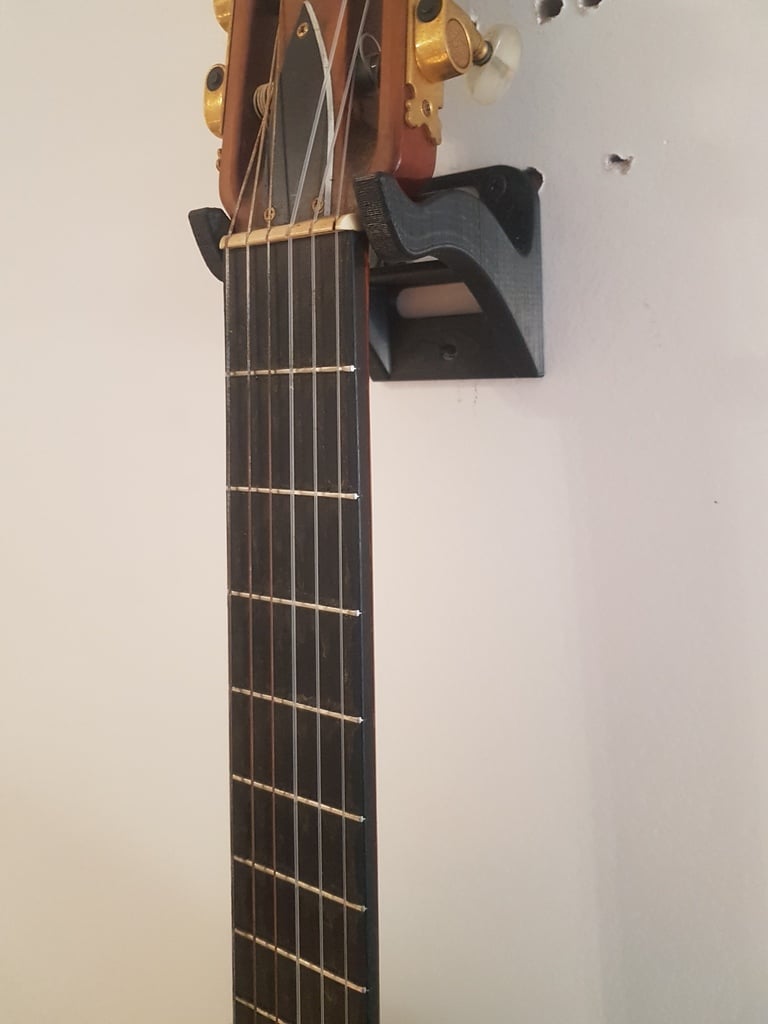 Wider wall mount for Spanish guitar