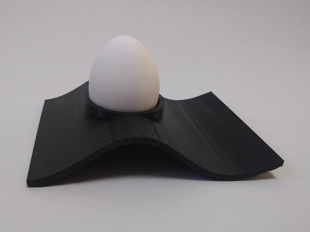 Wave-shaped egg cup in modern design
