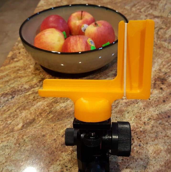 Phone holder for camera stands