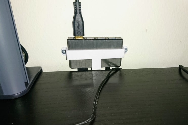 Wall mount for Icybox IB-AC610 4-port USB hub