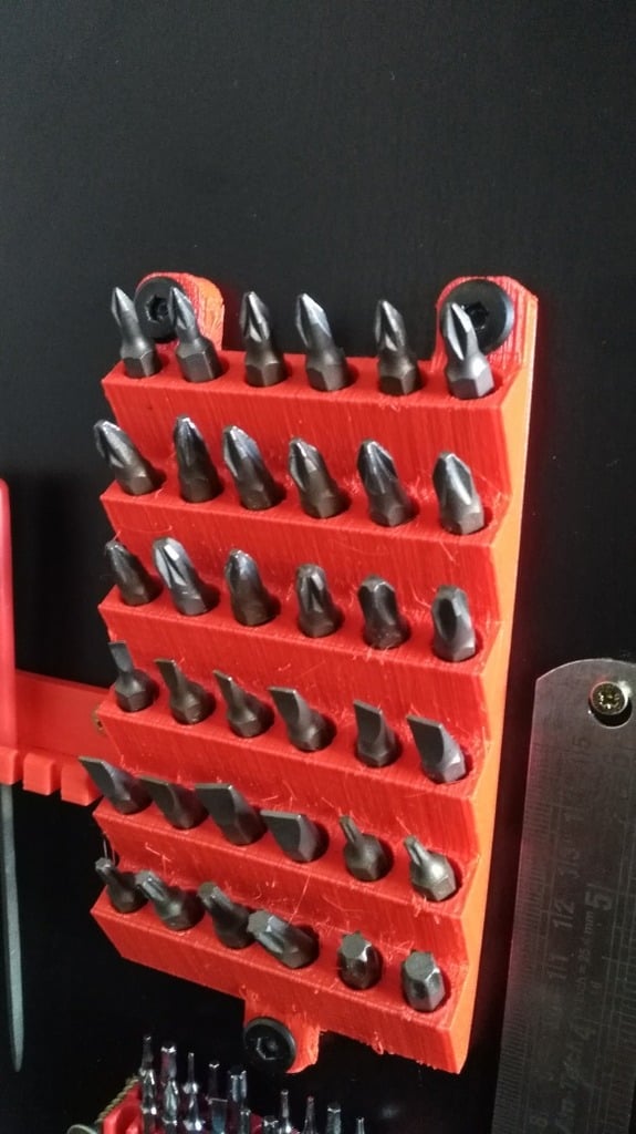 Wall-mounted holder for screwdriver bits