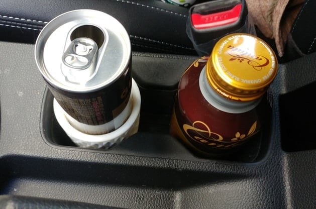 Adapter for small cans for the car&#39;s large can holder