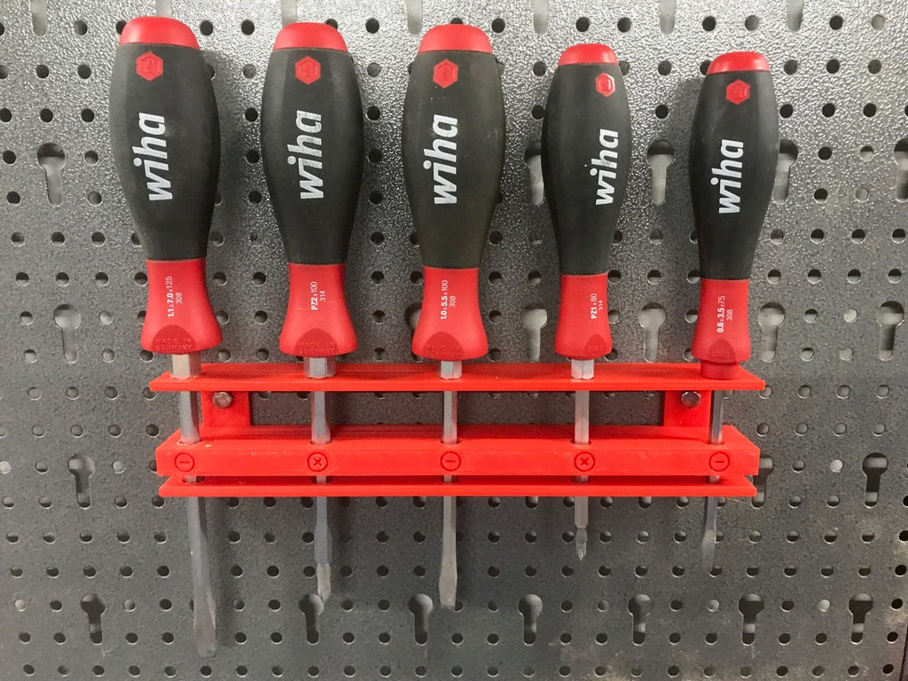 Holder for screwdrivers and drills