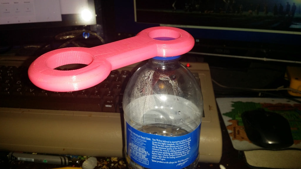 Plastic bottle opener for water and soda bottles for arthritis sufferers