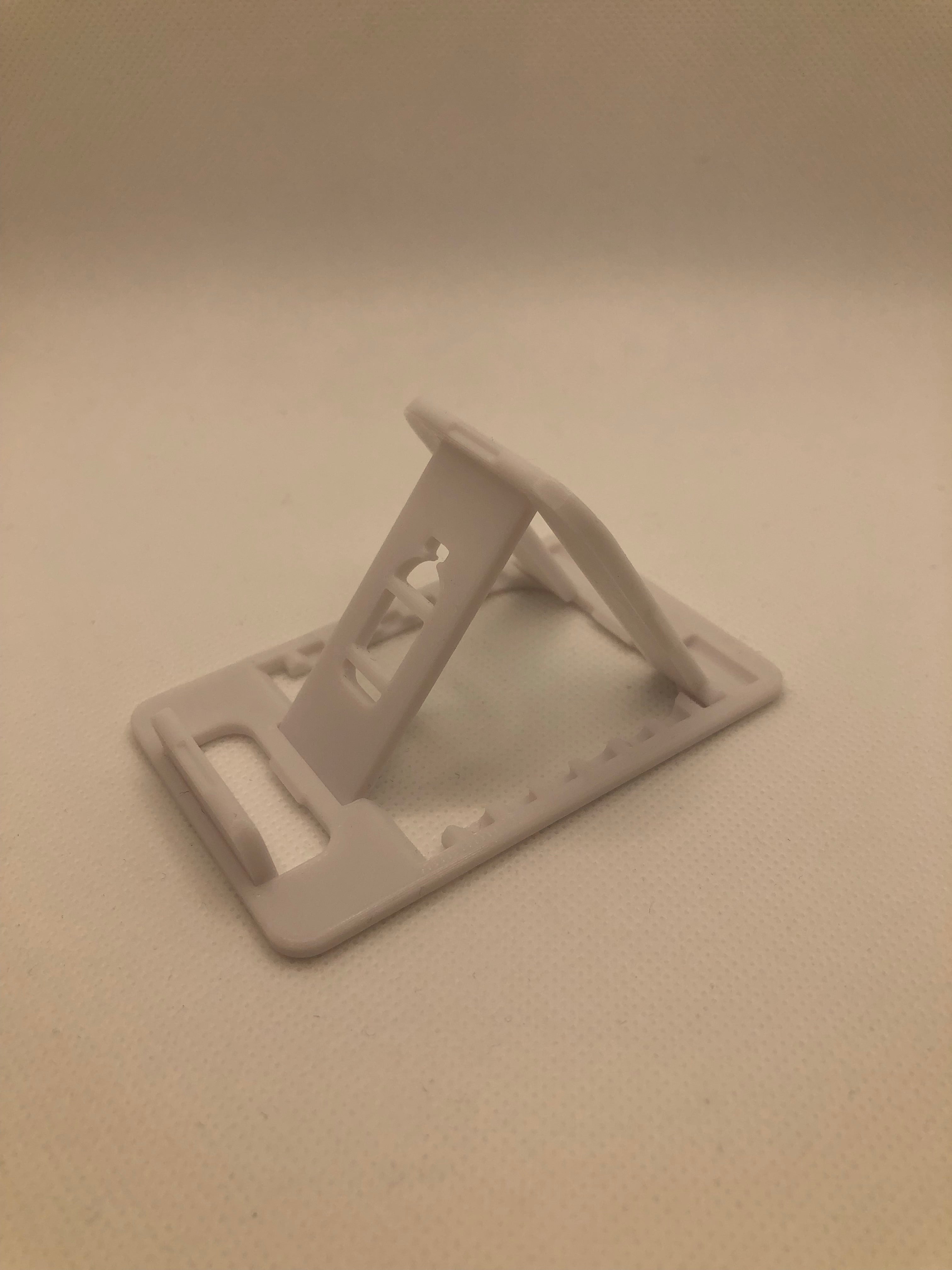 Foldable mobile phone holder in credit card size