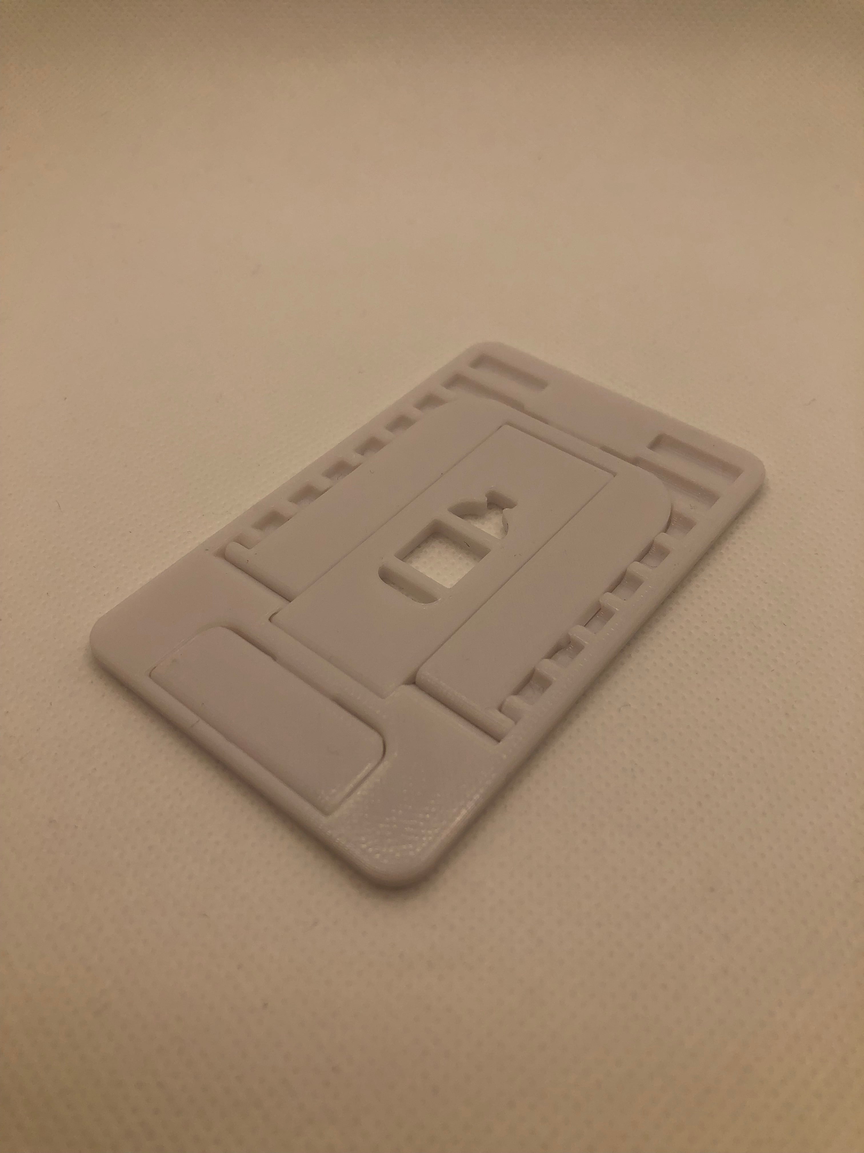 Foldable mobile phone holder in credit card size