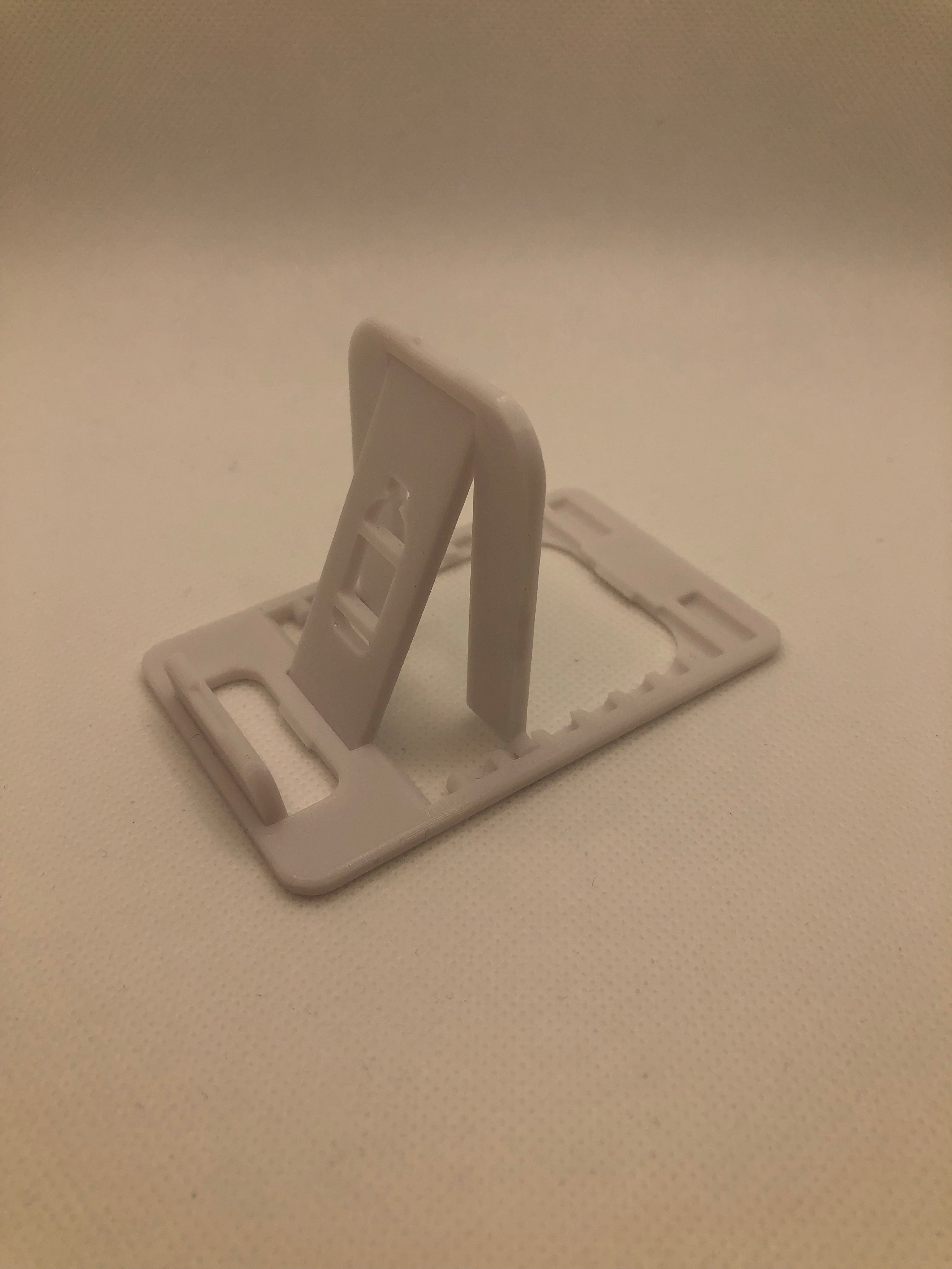 Foldable mobile phone holder in credit card size