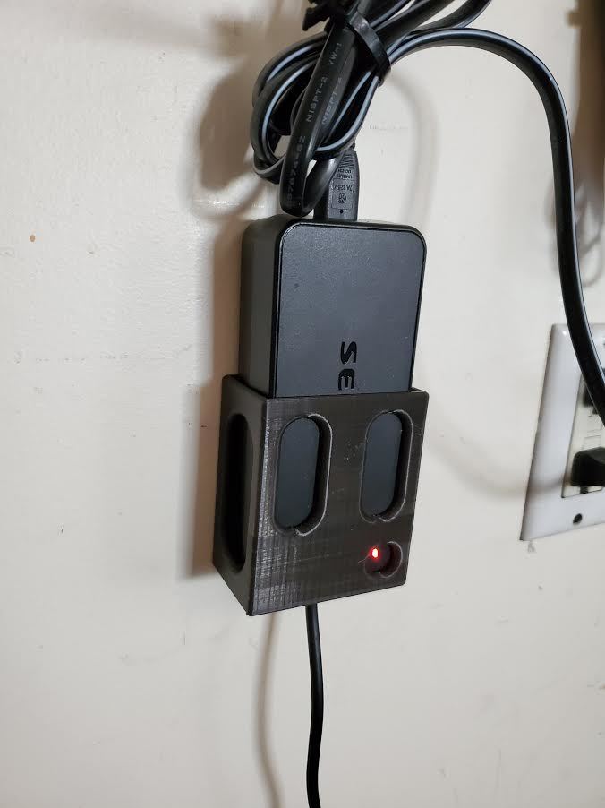 Wall bracket for a Segway ninebot charger
