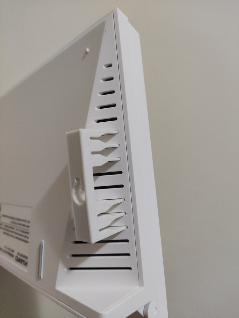 Wall mount for a Huawei AX3 Router