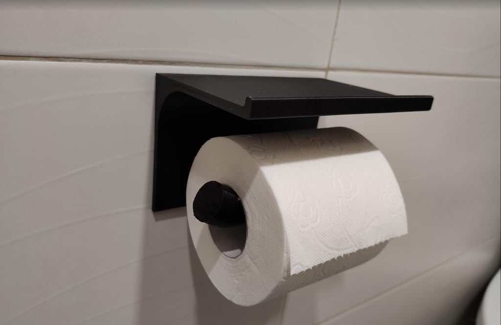 Toilet paper holder with shelf