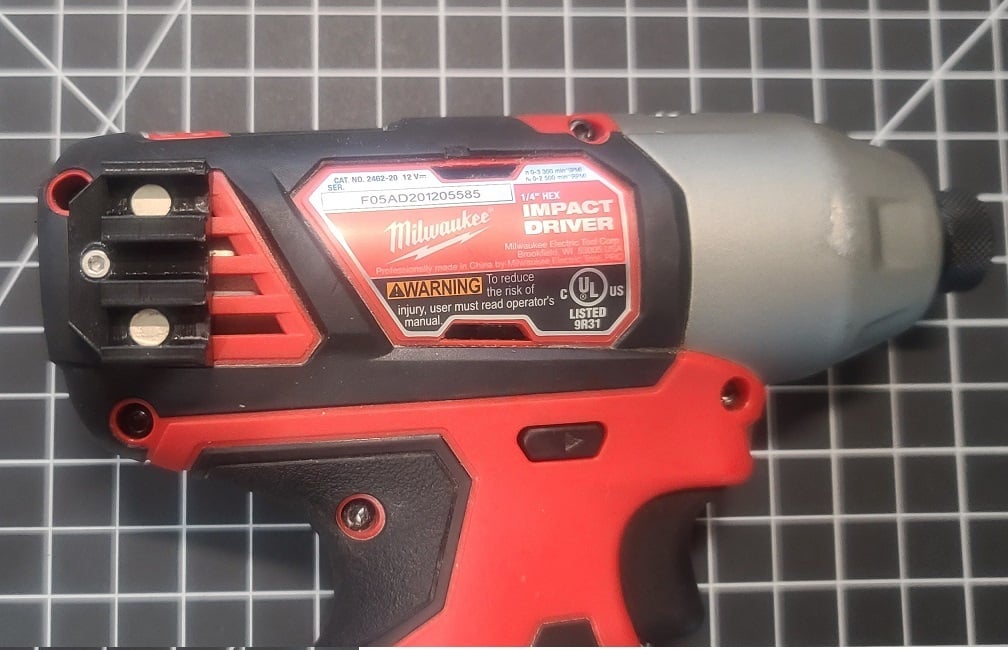 Milwaukee M12 drill with hex bit and magnetic drill bit holder