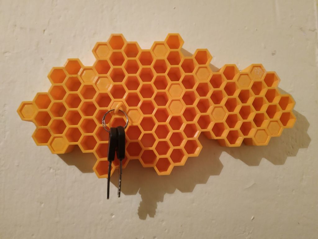 Honeycomb key organizer for wall mounting