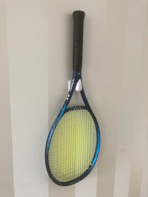 Simple wall-mounted holder for the tennis racket