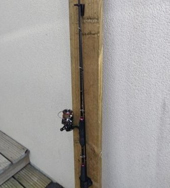 Fishing rod holder for easy storage