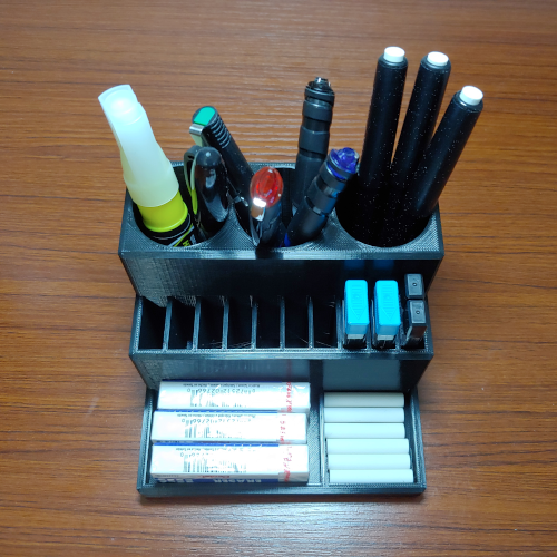 Small desk organizer for pencils, pens and erasers
