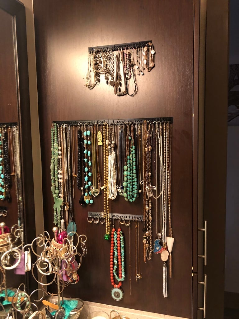 Wall-hung jewelry organizer with hot-glue hooks