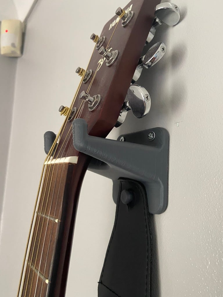 Guitar Wall mounting with space for picks and strap