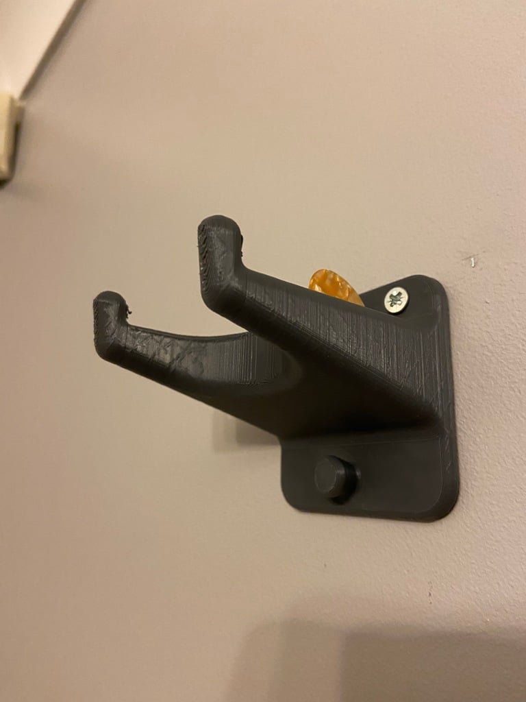 Guitar Wall mounting with space for picks and strap