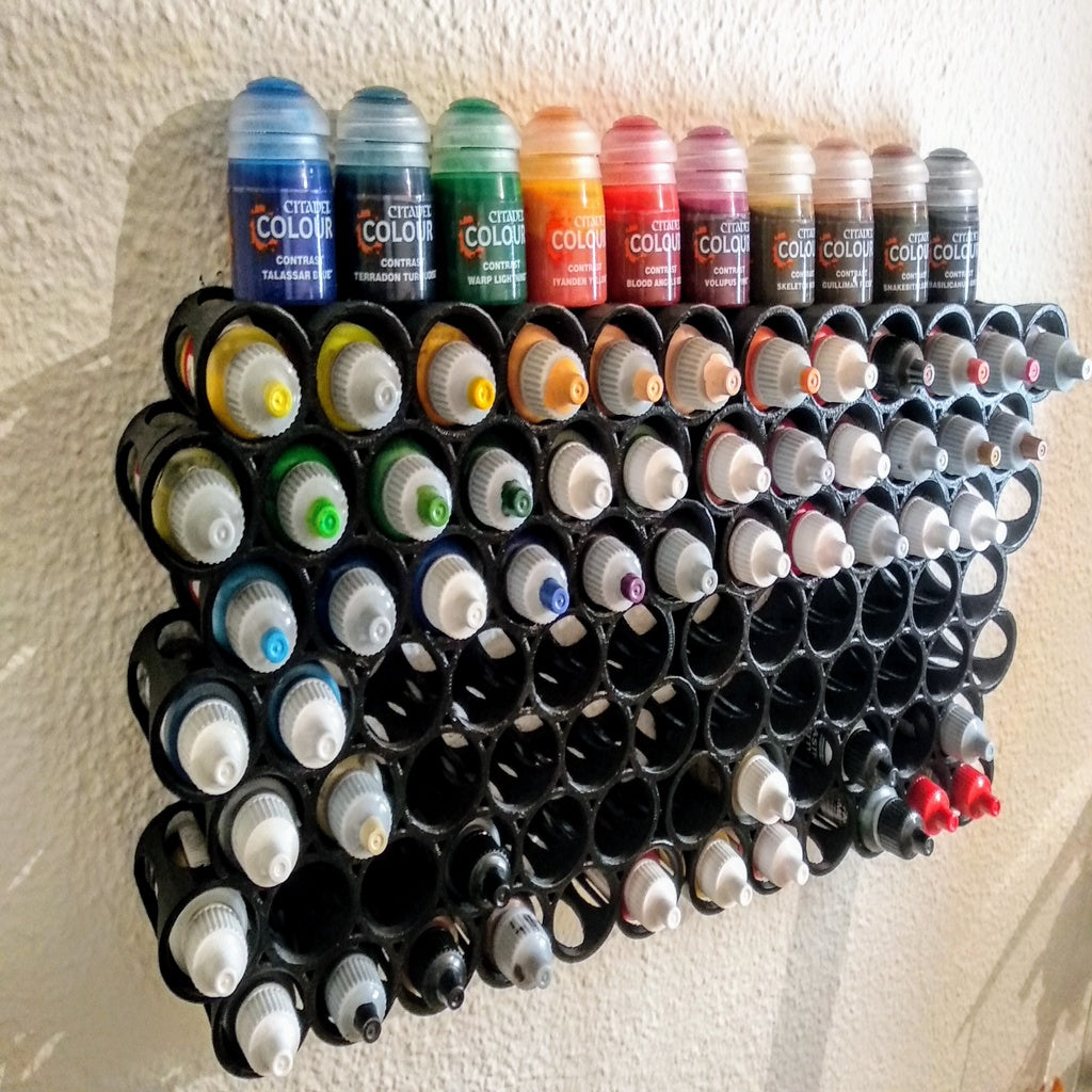 Wall bracket for paint bottles