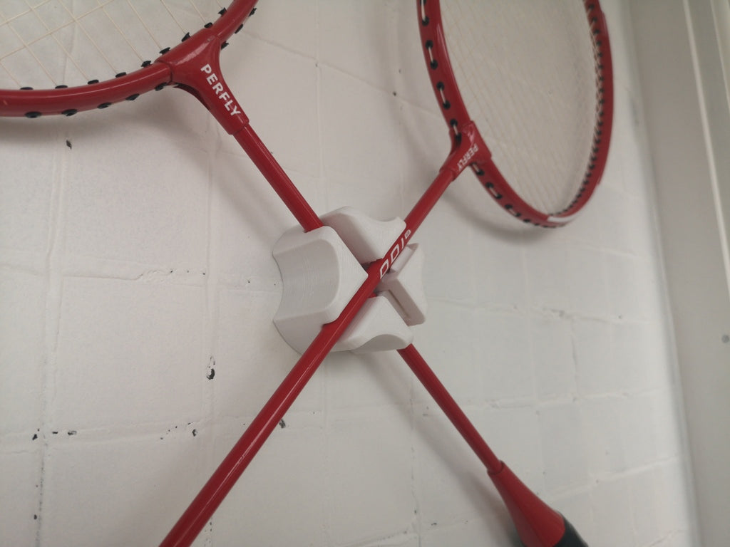 Wall-mounted badminton racket holder