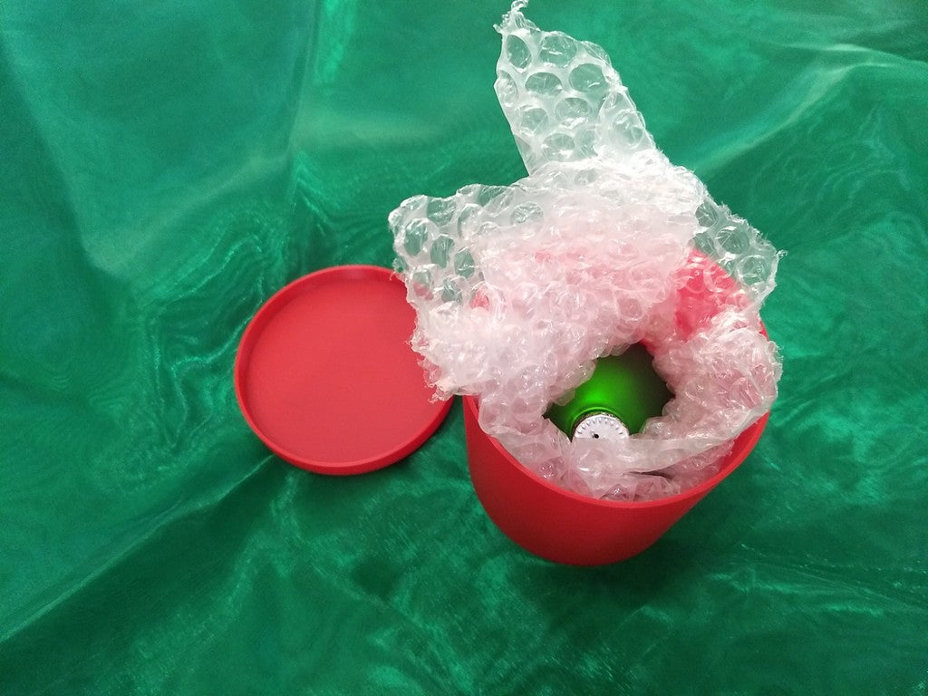 Protective container for Christmas ball ornaments in glass