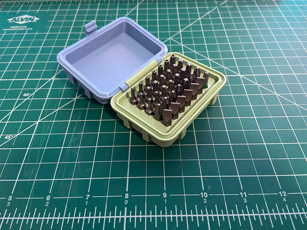Storage box for screwdriver bits