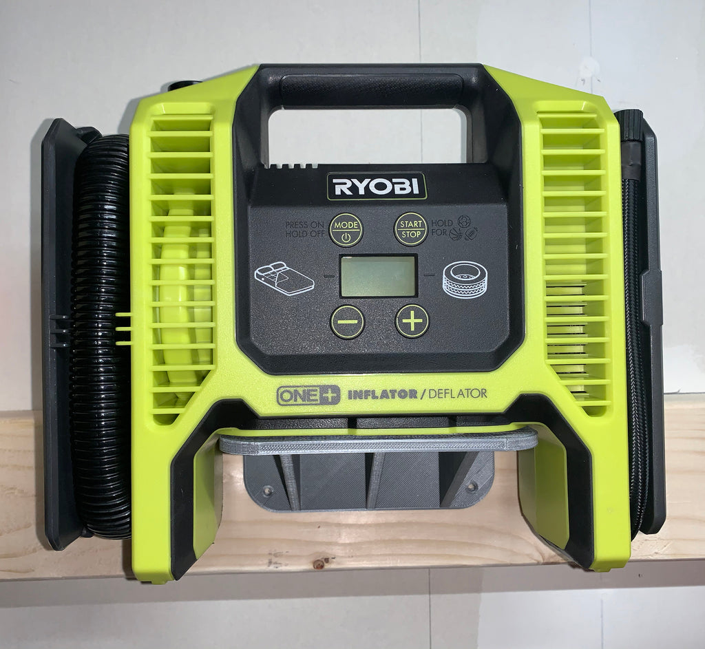 Wall-mounted Ryobi One+ tool shelf and holder