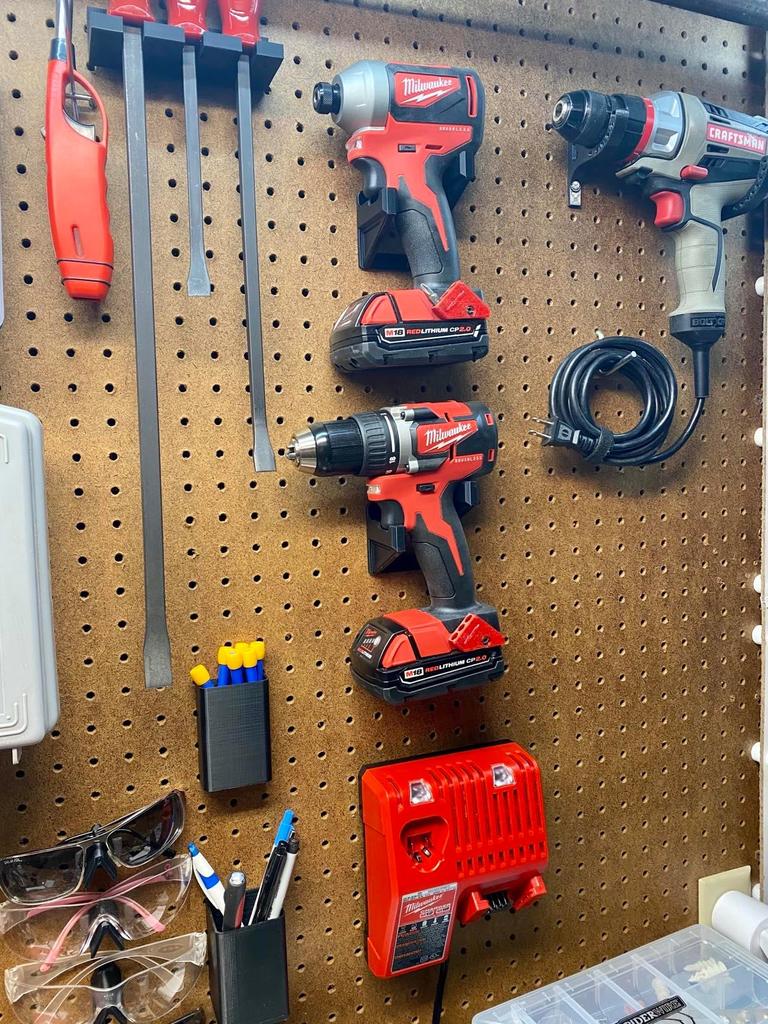 Wall-mounted Holder for Cordless Tools on Blackboard