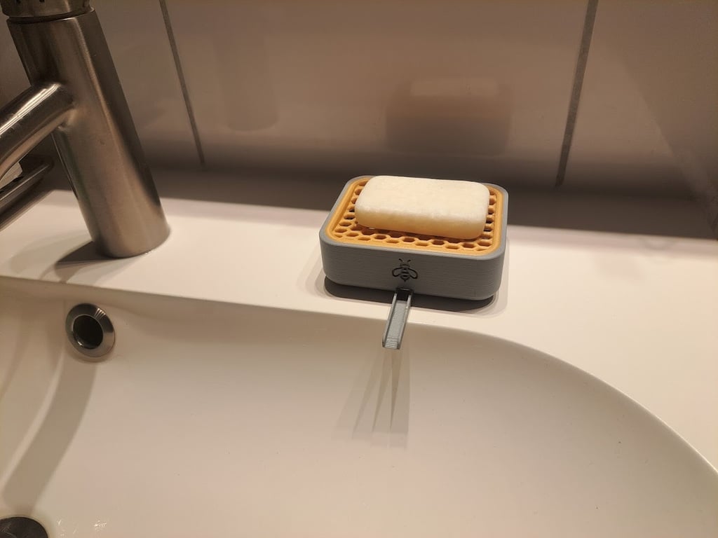 Soap dispenser with drain for bathroom