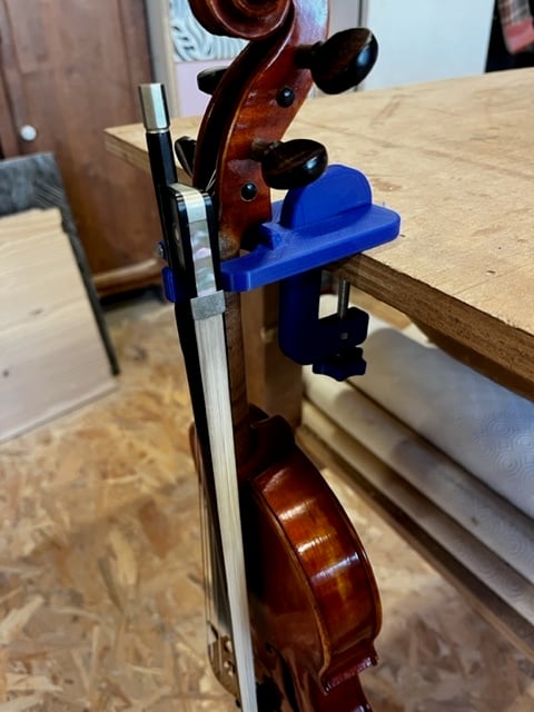 Support for table for violin