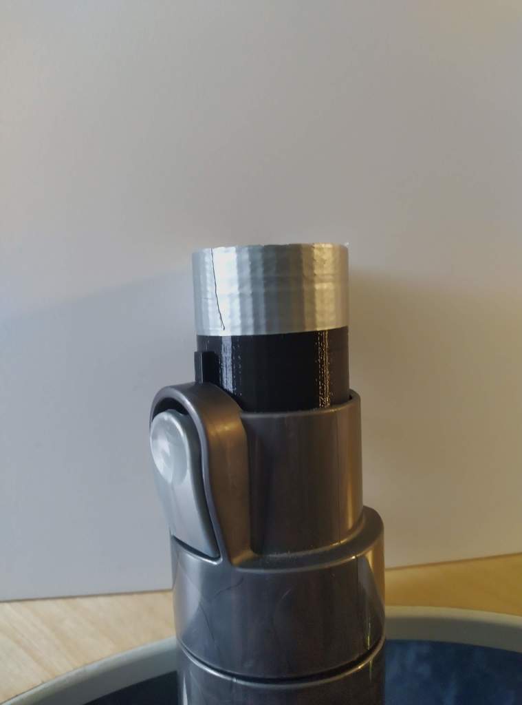 Adapter for custom attachments for a Dyson DC 33