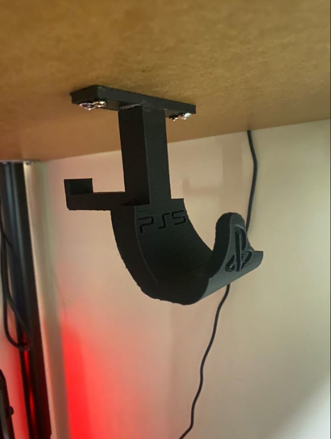 Under-desk mounting for PS5 controller and headset