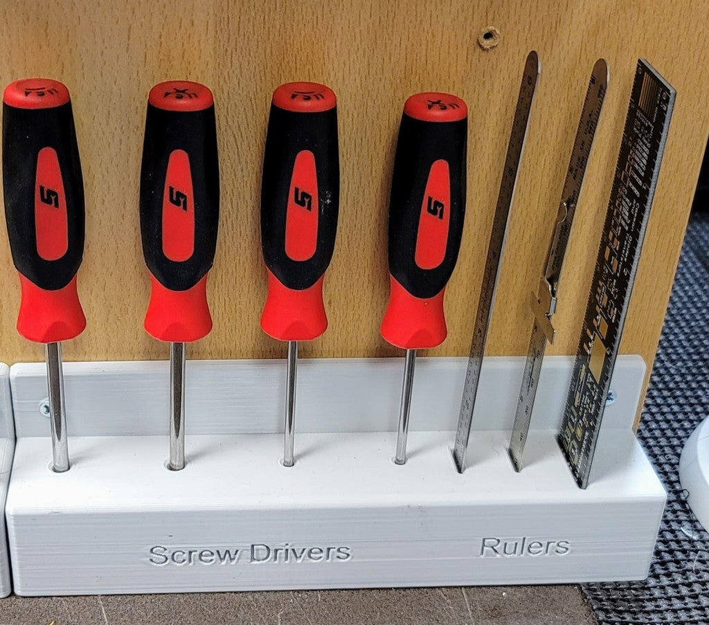 Wall or desktop stand for screwdrivers and 6-inch rulers